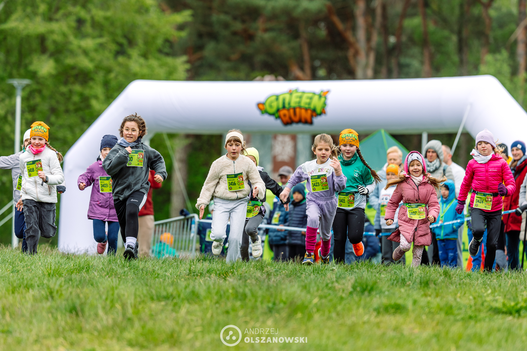 Plakat wydarzenia pod nazwą "Green Run Poznań" na którym znajduje się data i lokalizacja biegu.